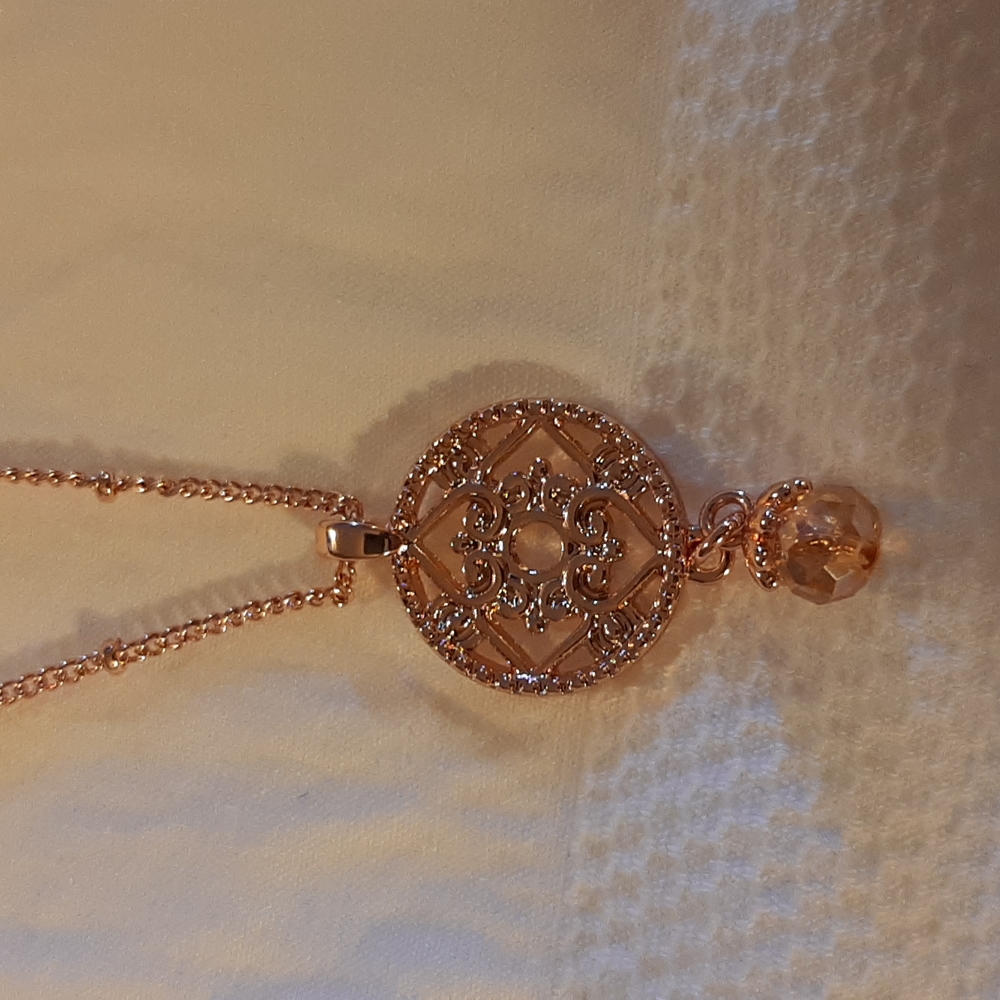 Calvin Klein beautiful Rosie gold colored necklace